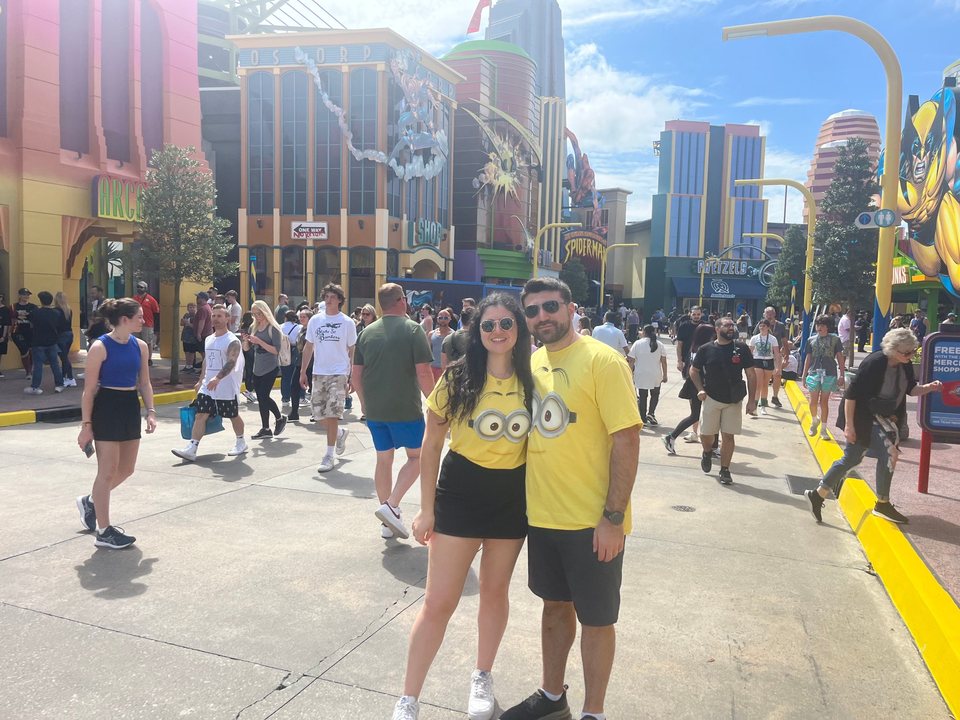 Jessica and Rami in matching Minion T-shirts on Marvel Super Hero Island at Universal Orlando