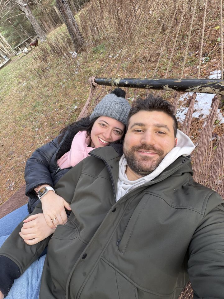 Jessica and Rami relaxing together in a hammock